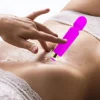 A girl using magic wand massager